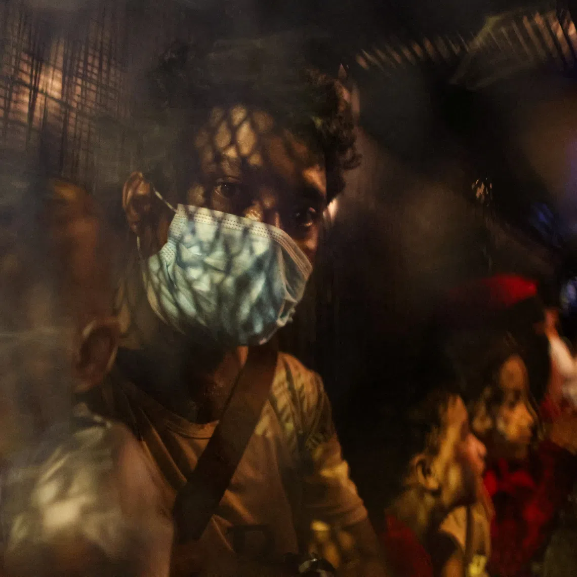 FILE PHOTO: Rohingya refugees sit inside a truck as they are taken by police, in front of the office of the U.N. Refugee Agency, after being evicted from their homes, at Kuala Lumpur Malaysia July 27, 2026. REUTERS/Hasnoor Hussain/File Photo