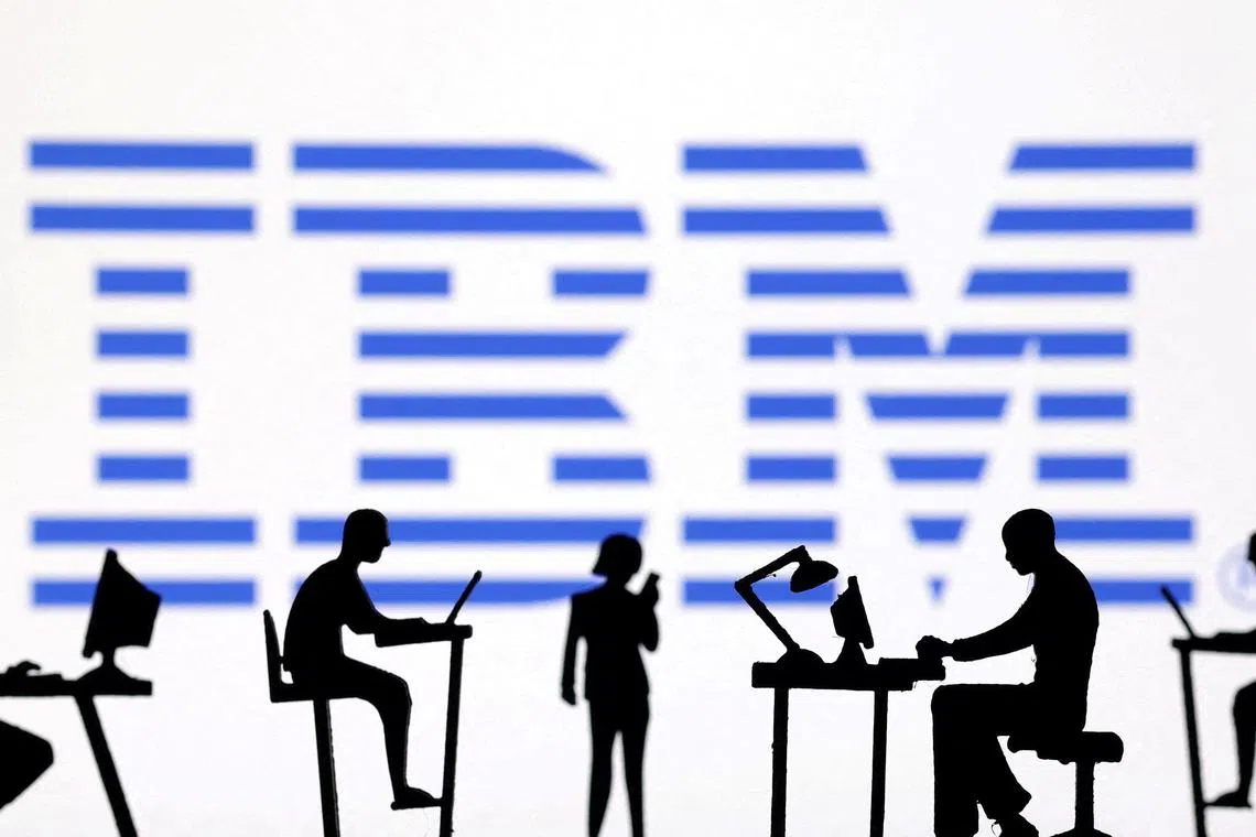 FILE PHOTO: Figurines with computers and smartphones are seen in front of IBM logo in this illustration taken, February 19, 2024. REUTERS/Dado Ruvic/Illustration/File Photo