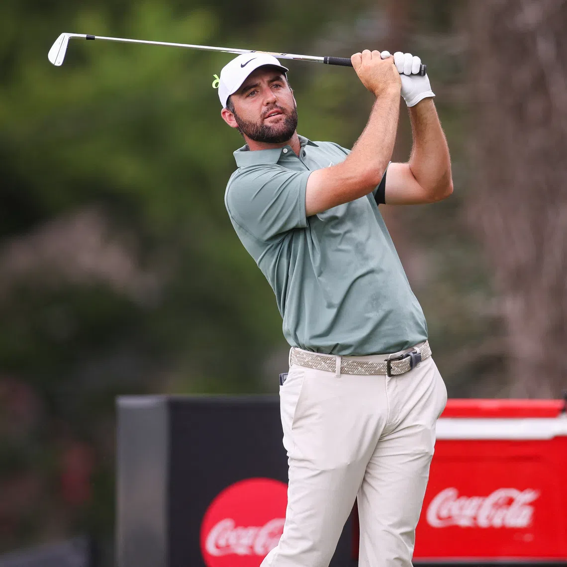 FILE PHOTO: Aug 24, 2025; Atlanta, Georgia, USA; Scottie Scheffler plays his shot from the second tee during the final round of the TOUR Championship golf tournament. Mandatory Credit: Brett Davis-Imagn Images/ File Photo