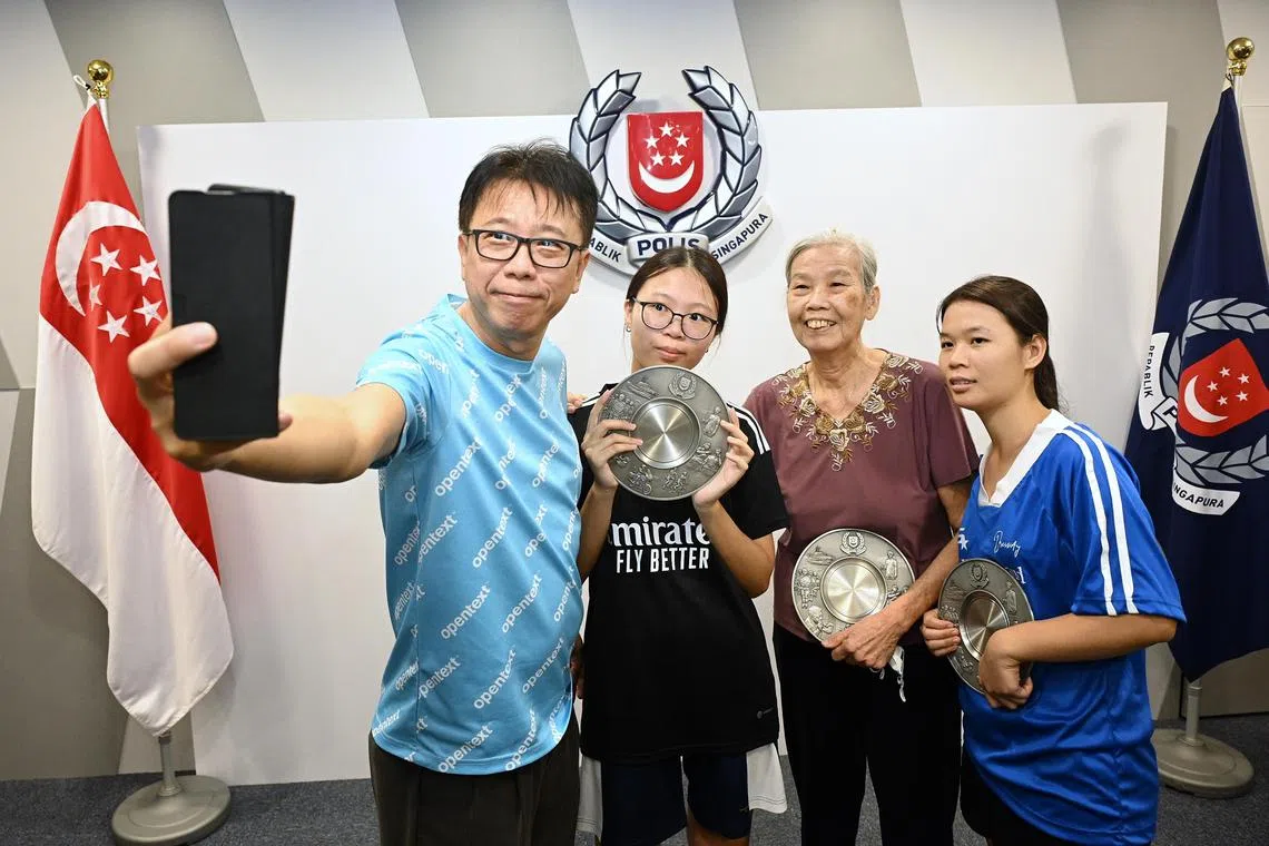 From left: Mr Siah Ee Fong (light blue shirt), Ms Siah Jia Lin, Ms Ho Soo Pong and Ms Aye Nandar Aung at the Bedok Police Division HQ on May 23, 2024. 