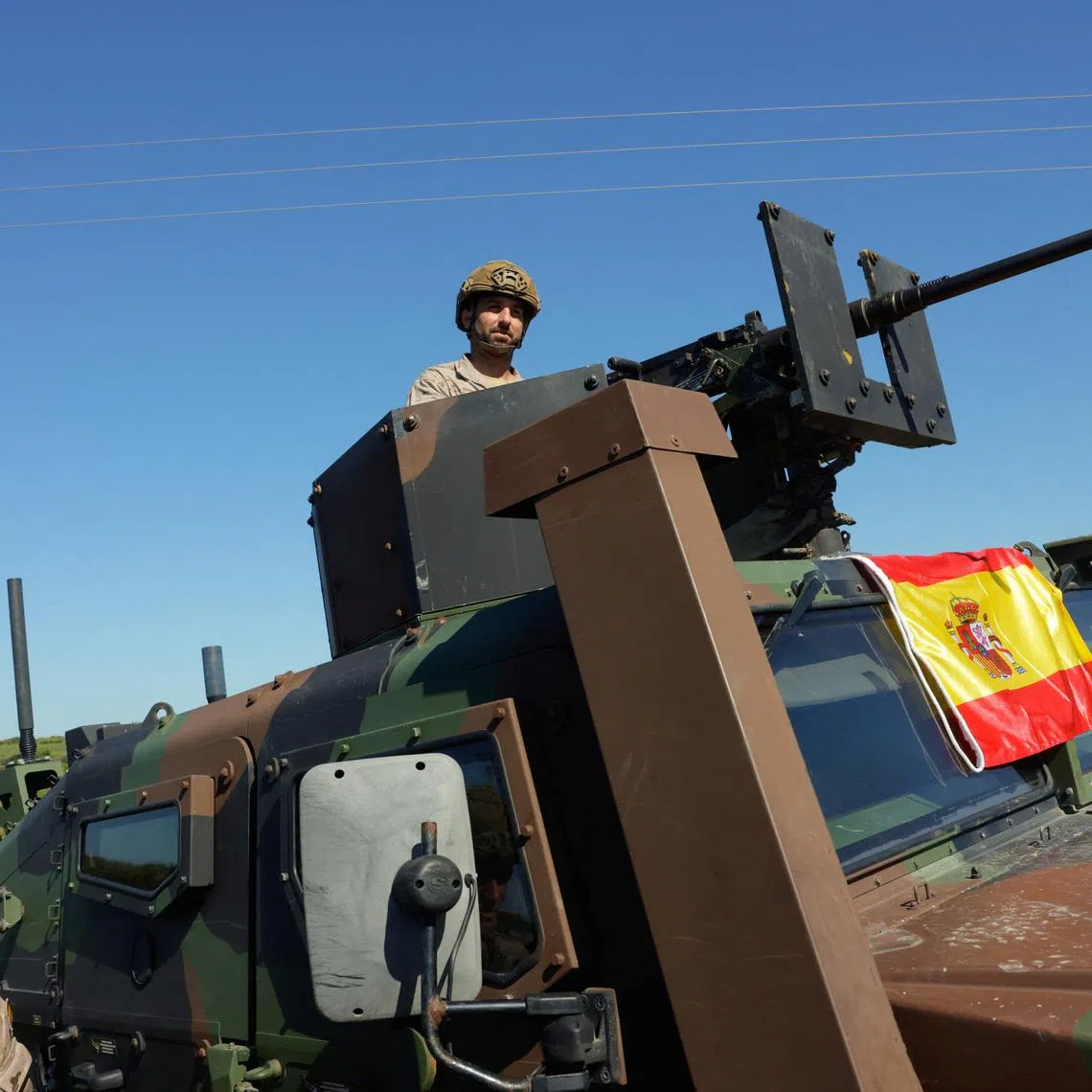 Spanish soldiers take part in Exercise Dynamic Mariner 25 military drill training, which involves naval forces from several NATO members, at Retin beach, in the Atlantic Ocean, in Barbate, Spain, March 28, 2025. REUTERS/Jon Nazca
