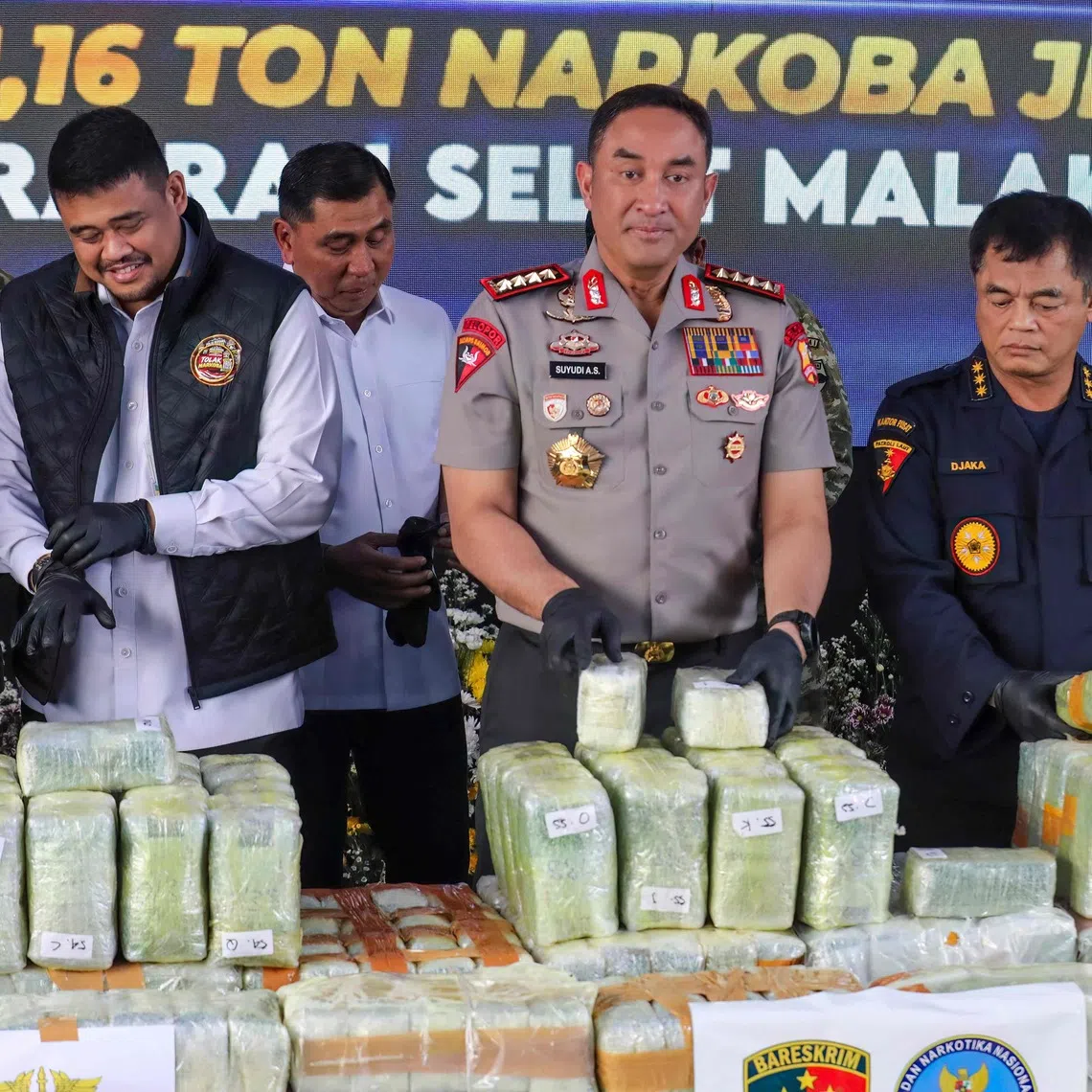 Indonesian police displaying seized drugs during a press conference in Belawan in Medan, North Sumatra province, on Oct 23.