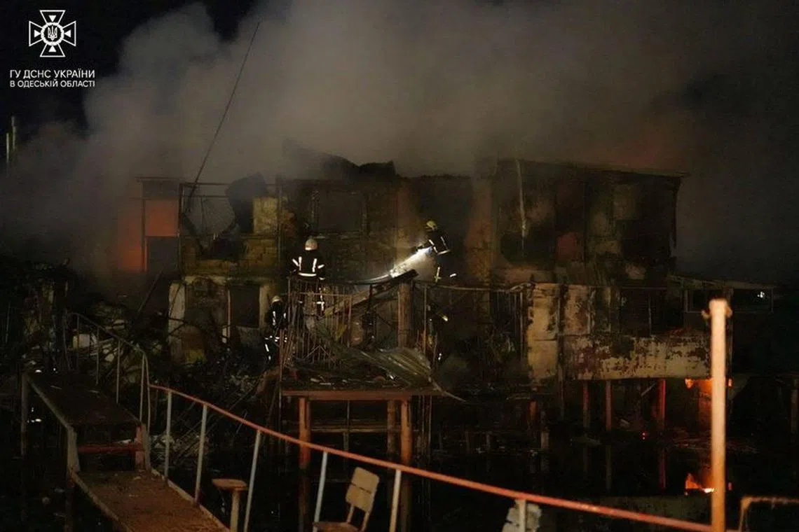 Rescuers work at a site of a Russian drone strike, amid Russia's attack on Ukraine, in Odesa region, Ukraine December 27, 2023. Press service of the State Emergency Service of Ukraine in Odesa region/Handout via REUTERS