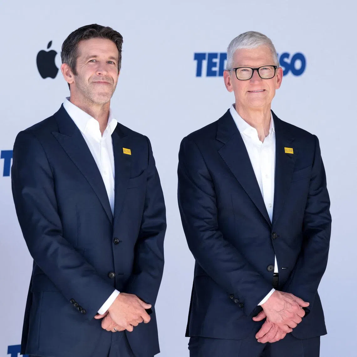 Tim Cook (right) is handing the reins to Apple’s new chief executive John Ternus after a 15-year tenure.