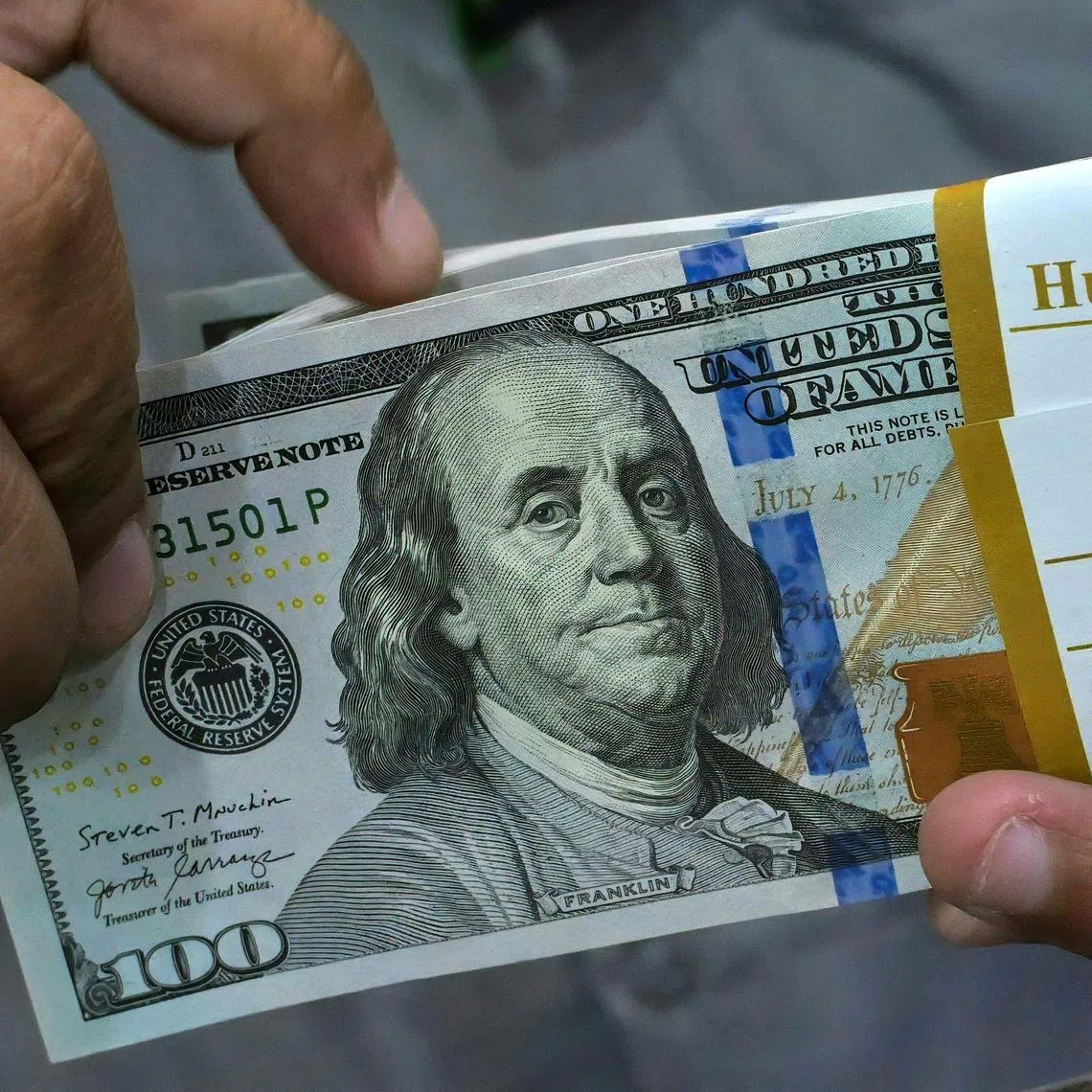 The Bloomberg Dollar Spot Index fell 0.2 per cent in early Asia trading on Aug 26 after Mr Trump said he fired the Fed governor.