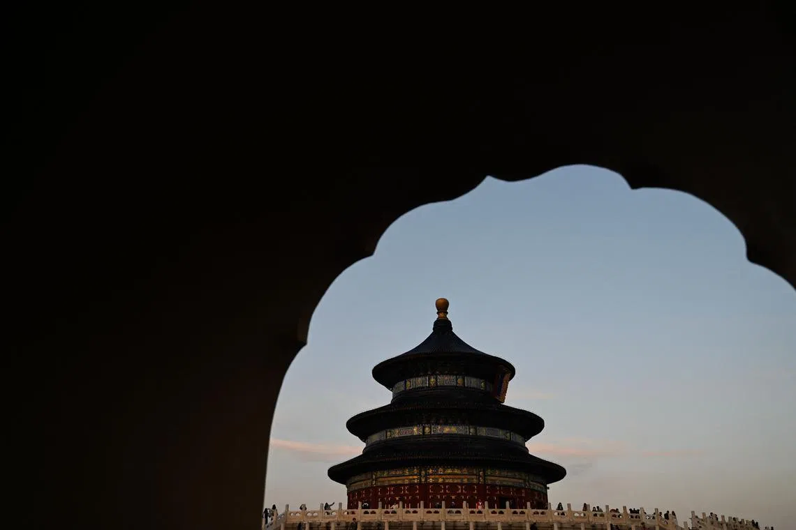 People visiting the Temple of Heaven in Beijing on Oct 10.
