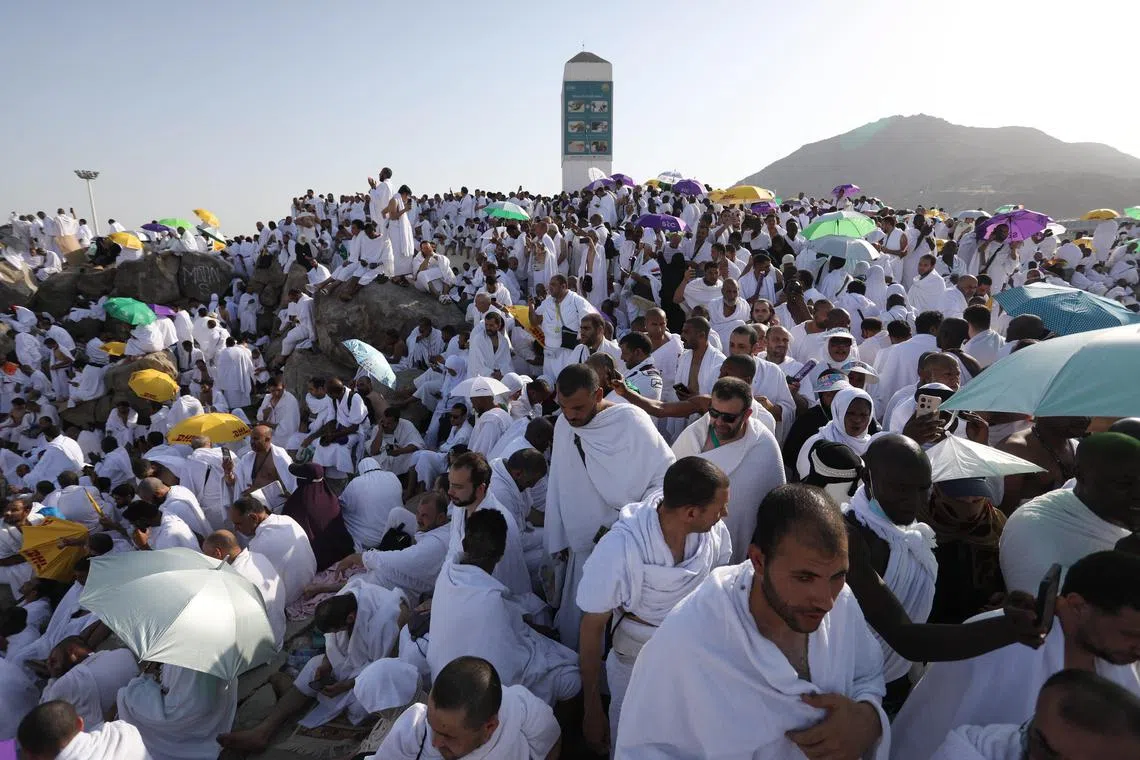 Muslim pilgrims gather on Mount Arafat during the 2023 haj pilgrimage.