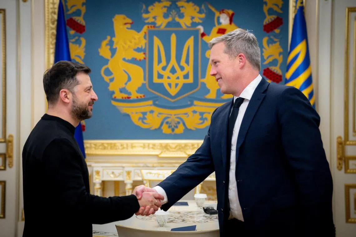 Ukraine's President Volodymyr Zelensky (left) welcomes US Army Secretary Dan Driscoll in Kyiv, Ukraine on Nov 20, 2025.  