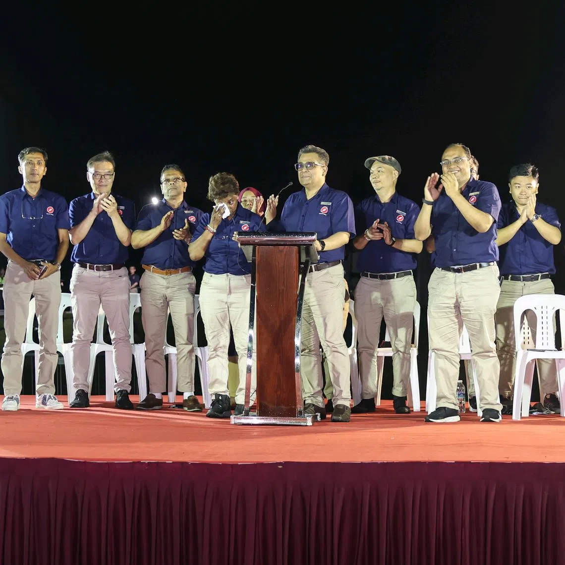 Jurong Central candidate Kala Manickam (fourth from left) got emotional when she said she has met many individuals who were retrenched, or jobless and unable to find a job.