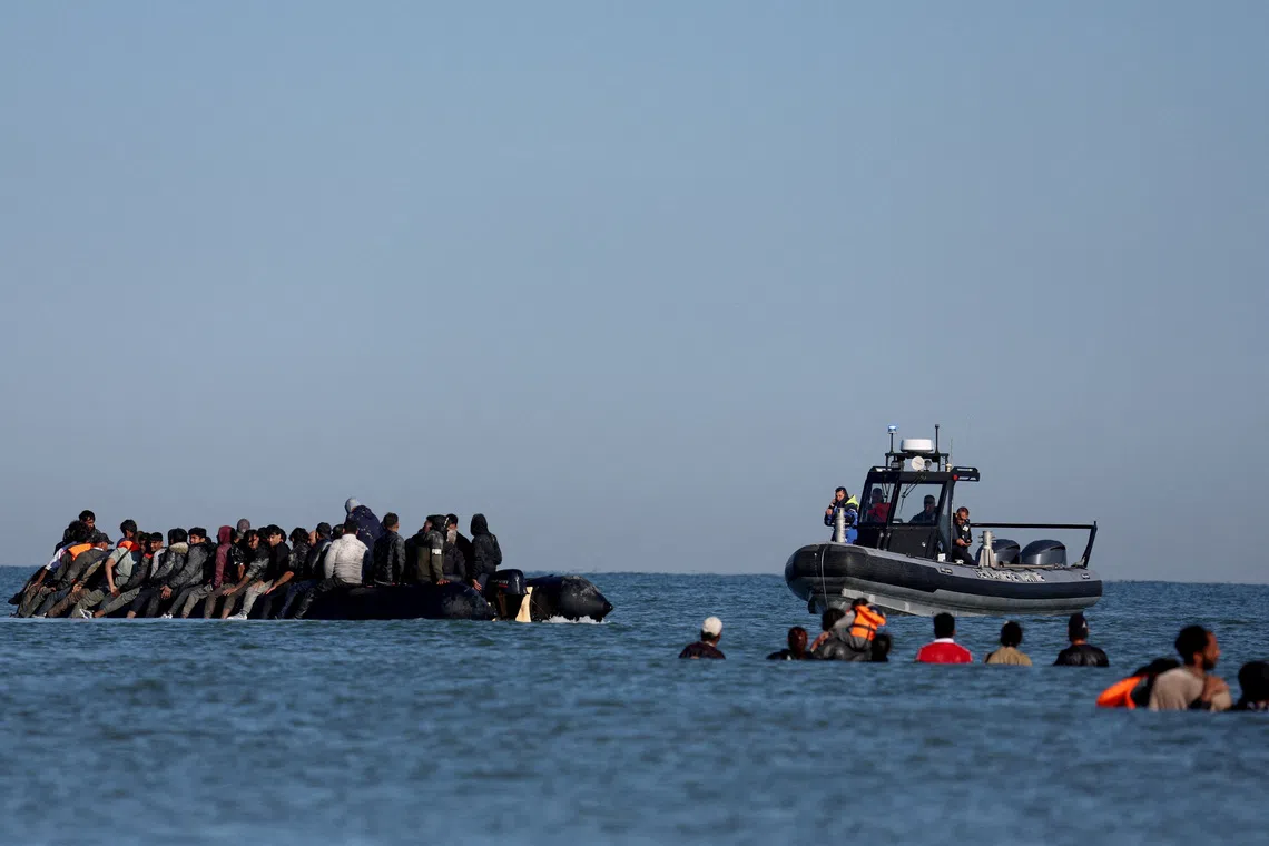 Britain reviews human rights laws in major shake-up of asylum policy