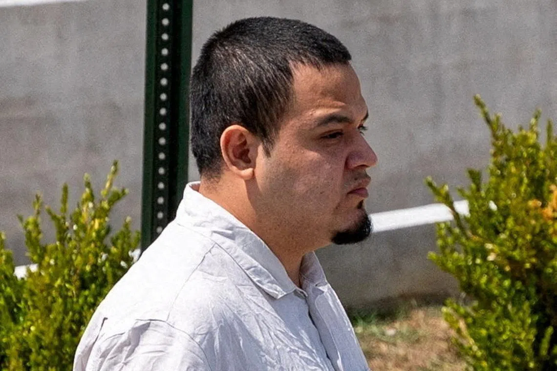 FILE PHOTO: Kilmar Abrego Garcia walks after he has been released from the Putnam County Jail in Cookeville, Tennessee, U.S., August 22, 2025.  REUTERS/Seth Herald/File Photo