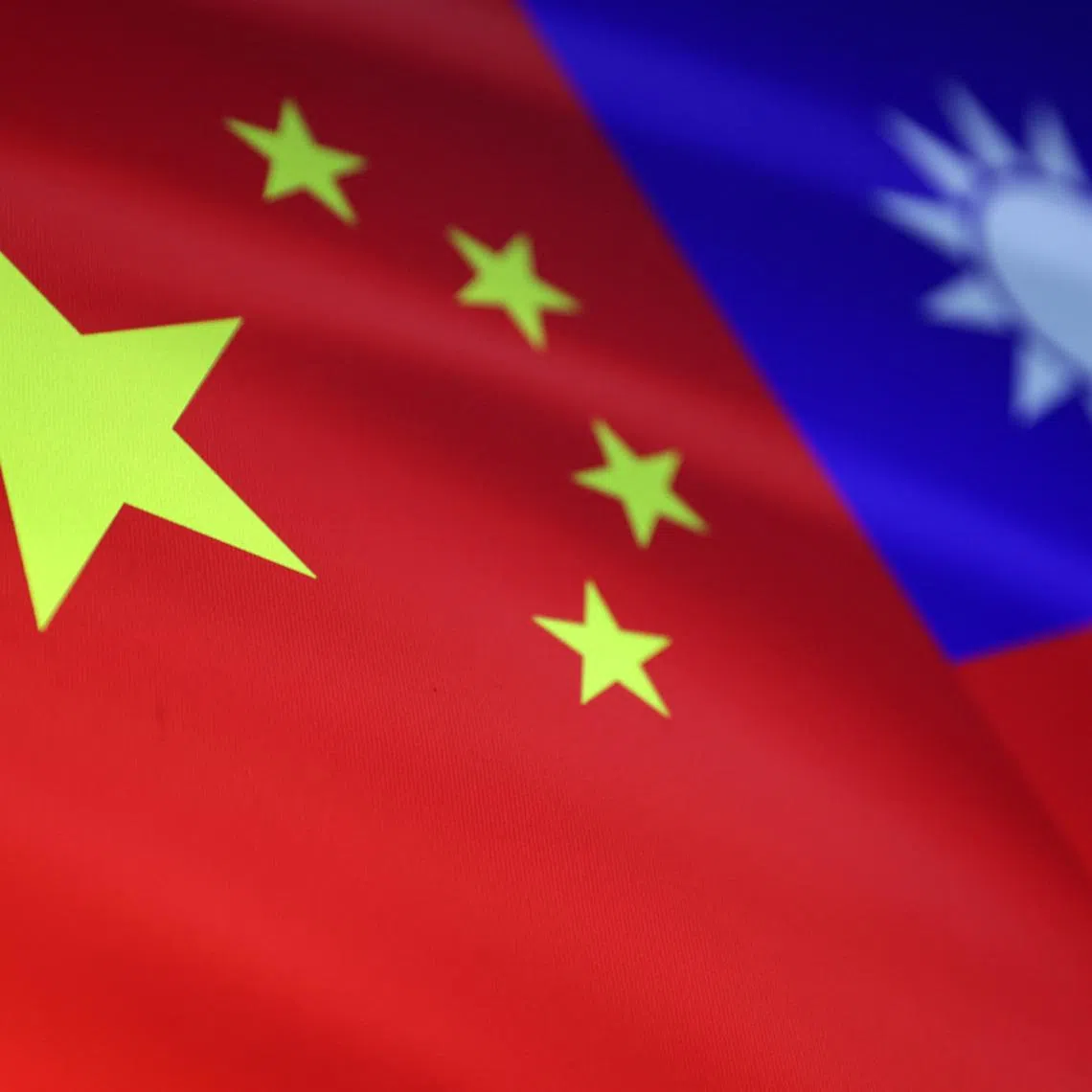 Chinese and Taiwanese flags are seen in this illustration, August 6, 2022. REUTERS/Dado Ruvic/Illustration/File Photo