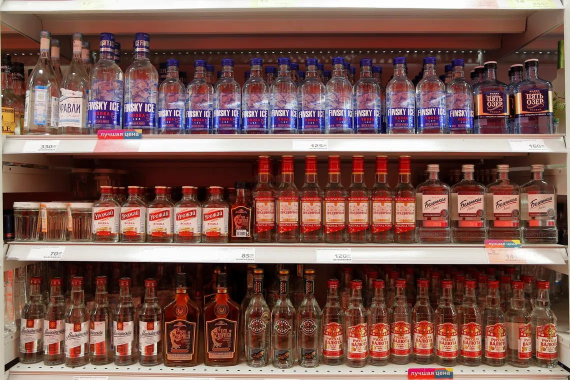 Bottles of vodka are displayed for sale in a supermarket in Moscow, Russia April 8, 2020. REUTERS/Maxim Shemetov/File Photo