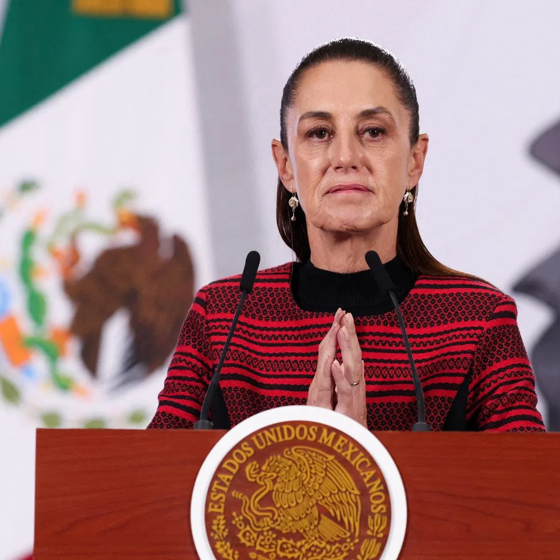 FILE PHOTO: Mexico's President Claudia Sheinbaum addresses the media in her daily press conference, in Mexico City, Mexico March 30, 2026. REUTERS/Quetzalli Nicte-Ha/File Photo