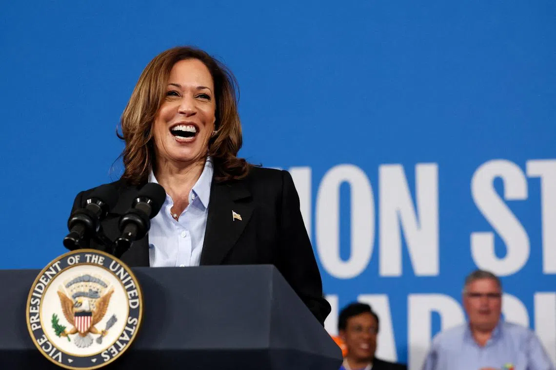 FILE PHOTO: Democratic presidential nominee and U.S. Vice President Kamala Harris reacts as she speaks at North Western High School in Detroit, Michigan, U.S., September 2, 2024. REUTERS/Brendan McDermid/File Photo
