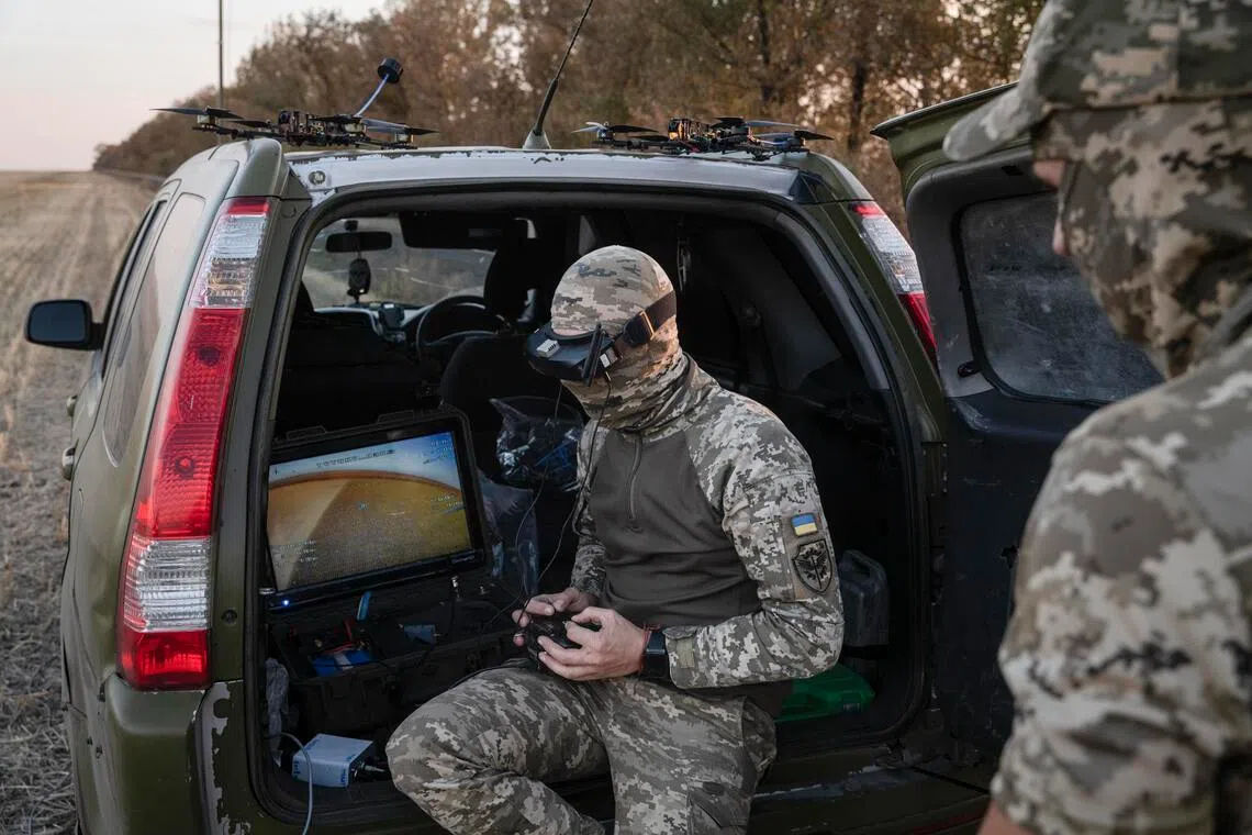 A Ukrainian drone operator testing a drone in the Donetsk region of Ukraine in 2024.