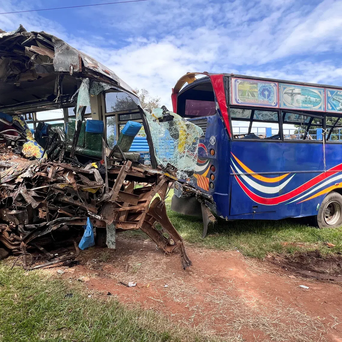 Wreckage of public transport buses involved in a head-on collision is parked at a police station near the scene of the deadly crash on the Kampala-Gulu highway in Kiryandongo district, near Gulu, northern Uganda, October 22, 2025. REUTERS/Stringer