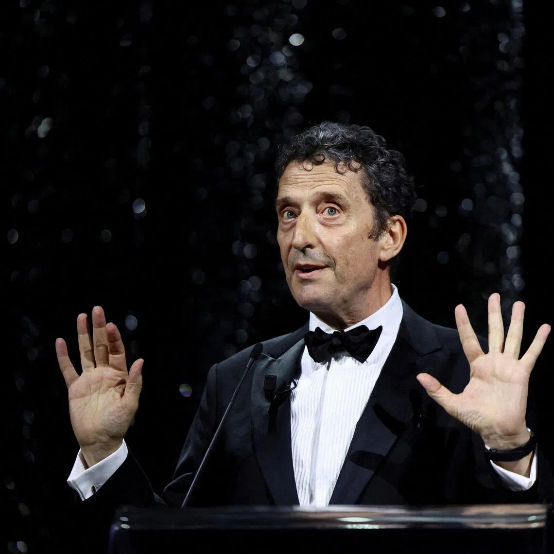 FILE PHOTO: President of the Venice Biennale Pietrangelo Buttafuoco speaks during the closing ceremony of the 82nd Venice International Film Festival, in Venice, Italy, September 6, 2025. REUTERS/Yara Nardi/File Photo