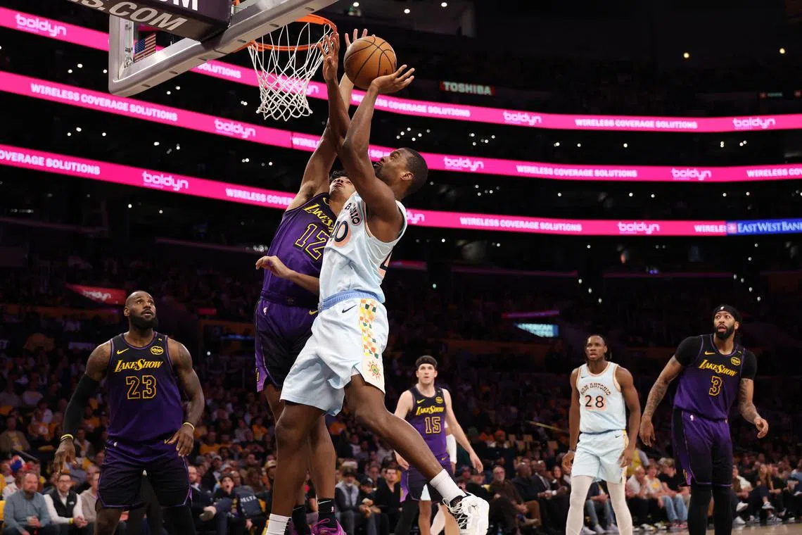 San Antonio Spurs forward Harrison Barnes shoots the ball against Los Angeles Lakers guard Max Christie during the second half at Crypto.com Arena.