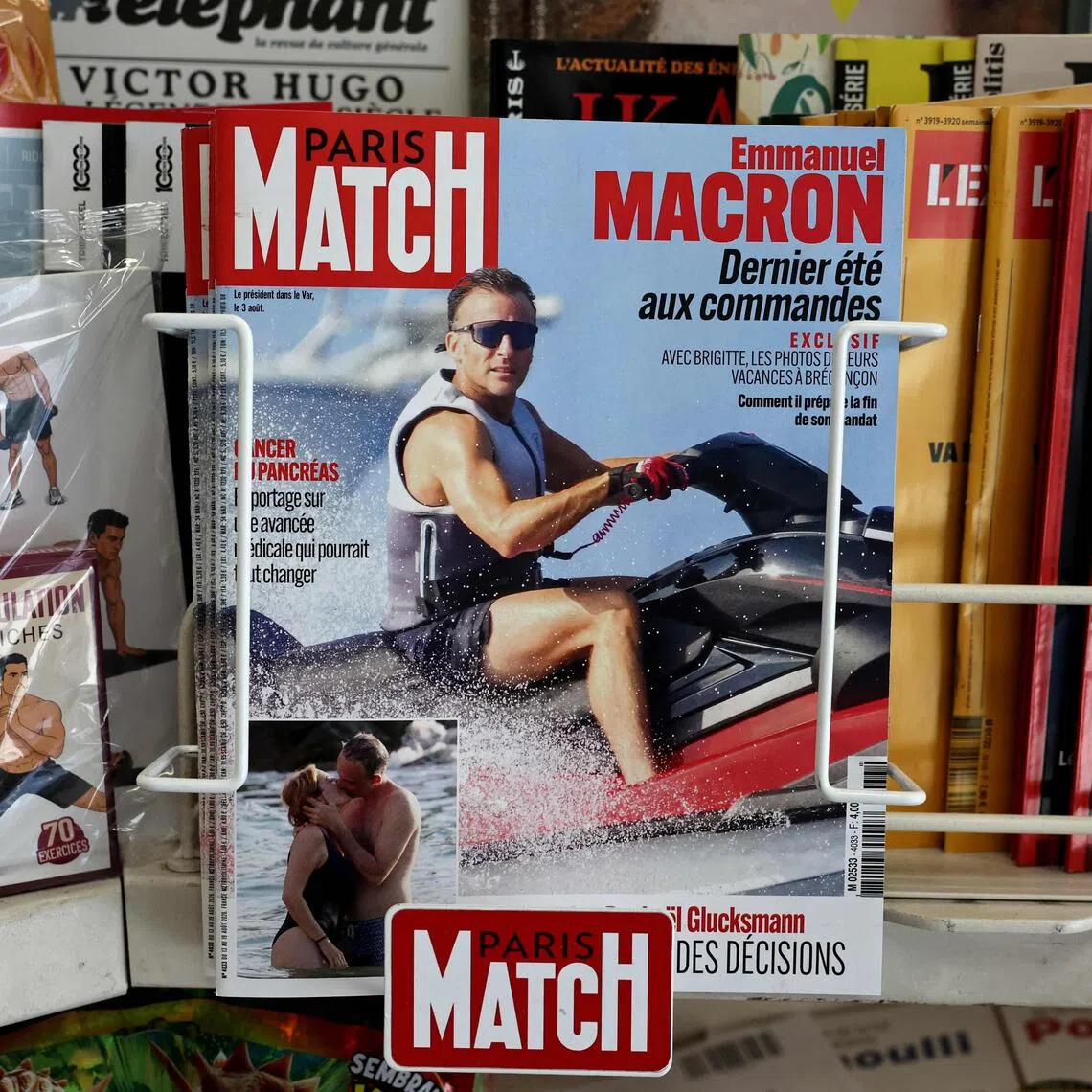 A photo of French President Emmanuel Macron on the cover of Paris Match magazine has fuelled opposition claims that he is disconnected from ordinary people grappling with heatwaves and wildfires.