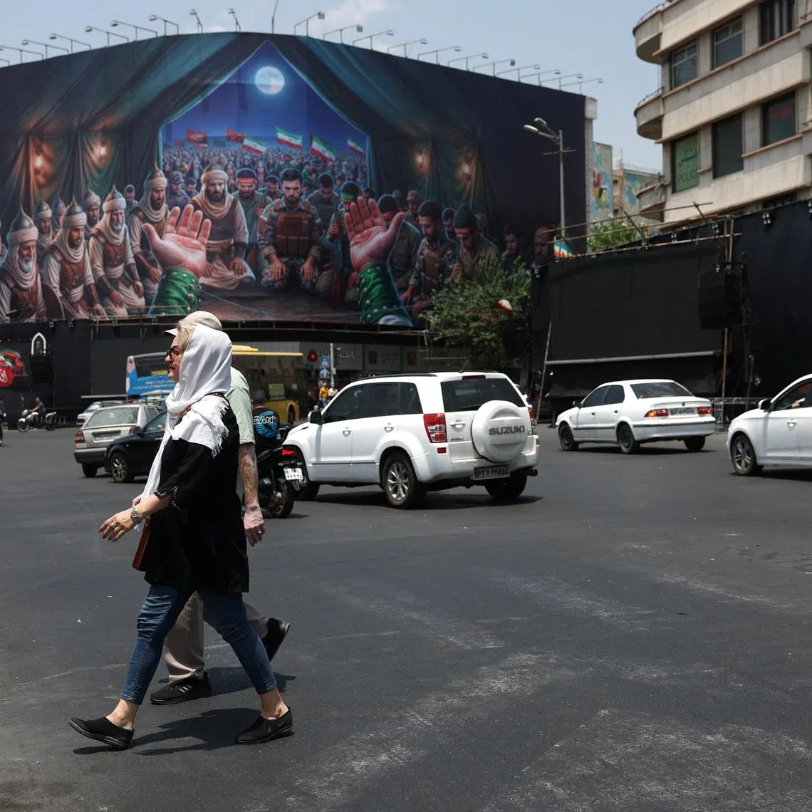 People walk on a street in Tehran, Iran, June 18, 2026. Majid Asgaripour/WANA (West Asia News Agency) via REUTERS