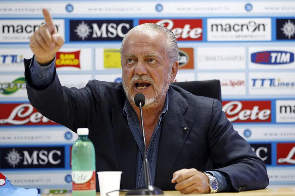 FILE PHOTO: Napoli club Chairman Aurelio De Laurentiis gestures during a news conference after Edinson Cavani (not pictured) renewed his contract until 2017, in Naples August 31, 2012.  REUTERS/Ciro De Luca/File Photo
