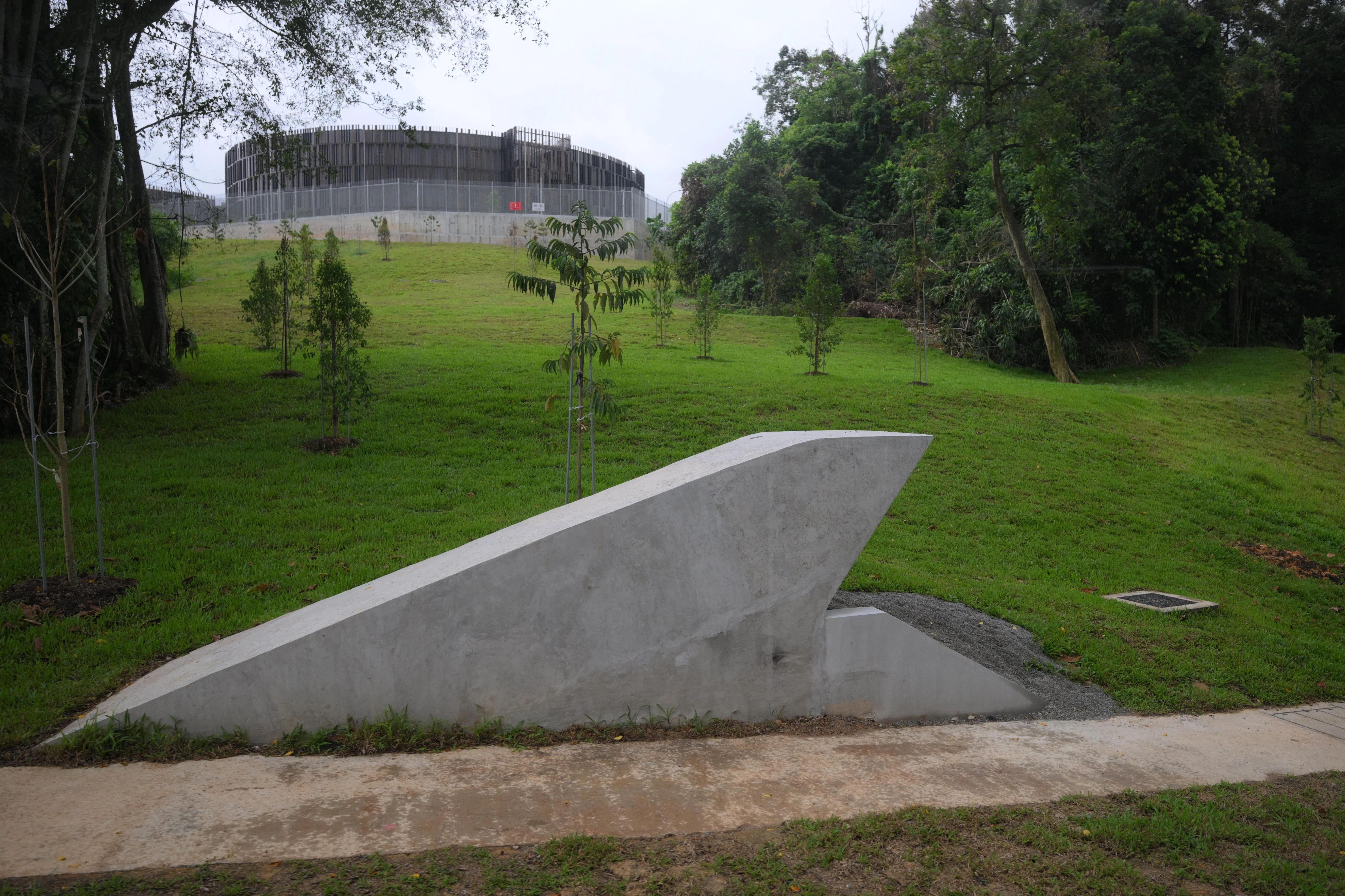 A wildlife crossing (bottom) near the Tengah Service Reservoir (top) to help animals get around.