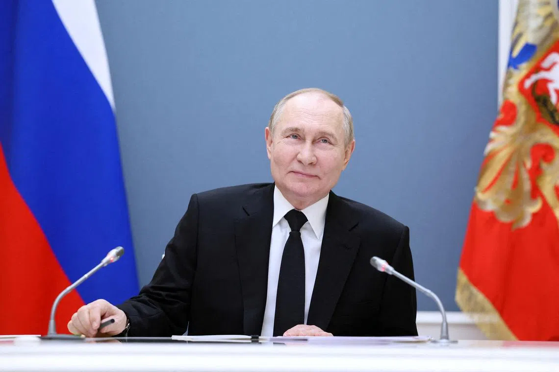FILE PHOTO: Russian President Vladimir Putin holds a meeting with large families from various Russia's regions via video link at the Kremlin in Moscow, Russia May 30, 2024. Sputnik/Alexander Kazakov/Pool via REUTERS/ File Photo