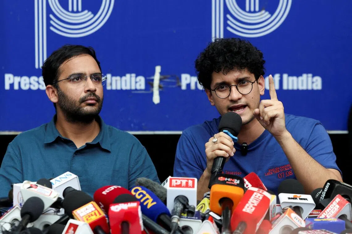 Saurav Das, chief spokesperson of the Cockroach Janta Party (CJP), speaks next to Ashutosh Ranka, co-convenner of CJP.