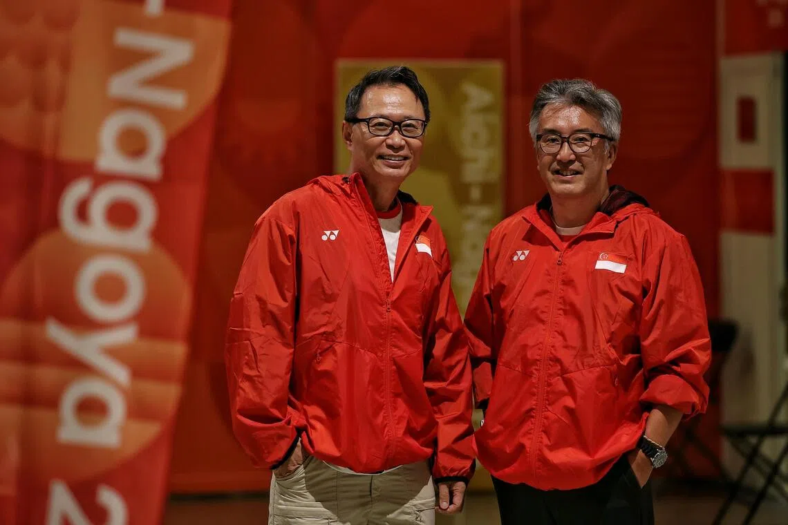 Vicente Tai (left) and Yuichiro Kubo are volunteers with the Singapore National Olympic Council (SNOC) at the Aichi-Nagoya