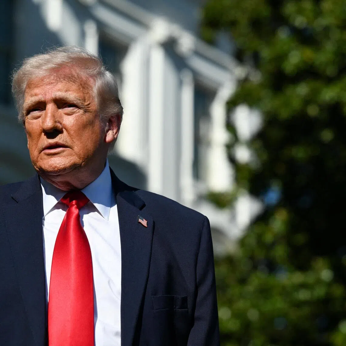 U.S. President Donald Trump looks on, as he departs from the White House, en route to Joint Base Andrews (JBA), in Washington, D.C., U.S., April 11, 2026. REUTERS/Annabelle Gordon