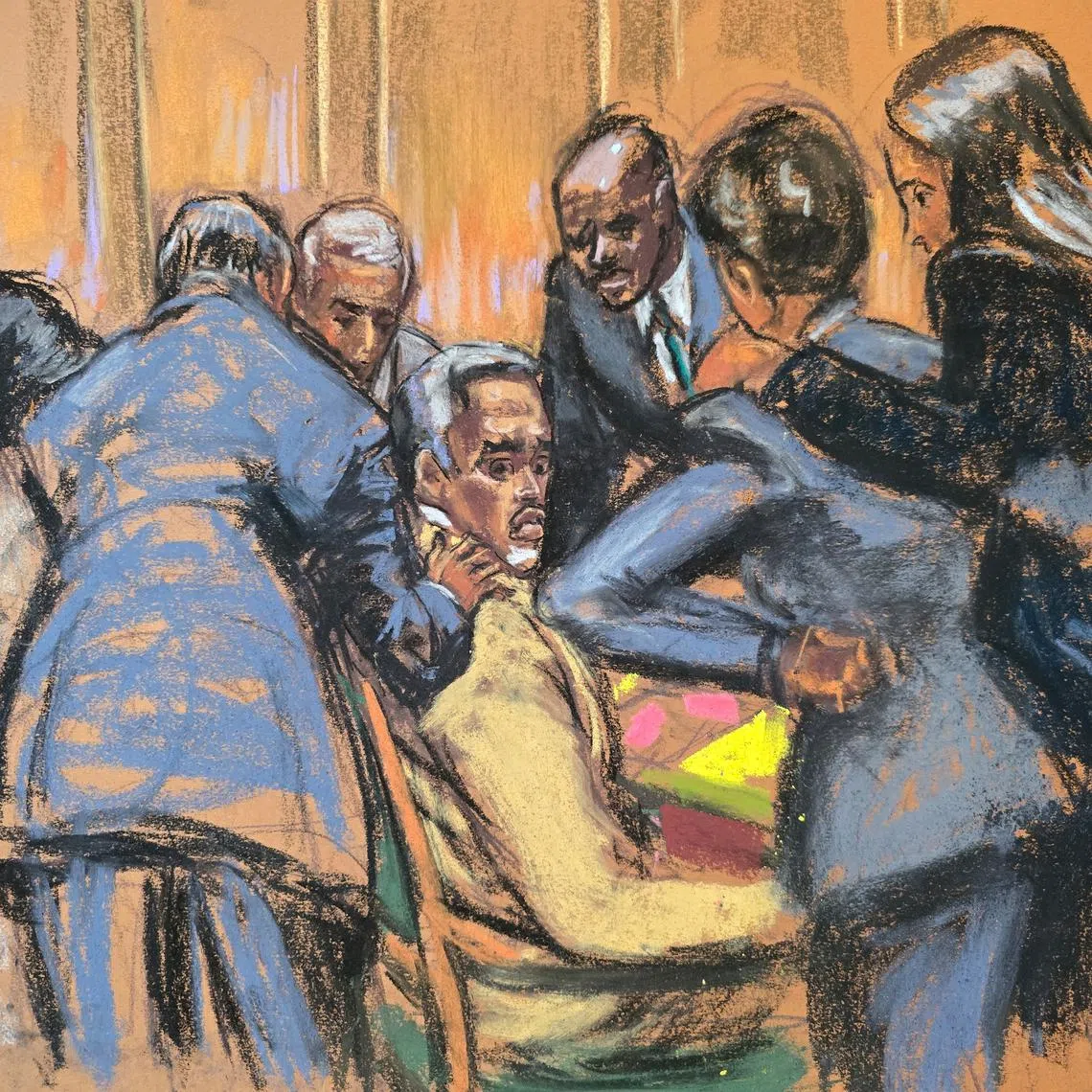 Defense lawyers comfort Sean 'Diddy' Combs during his trial in New York City, on July 1.