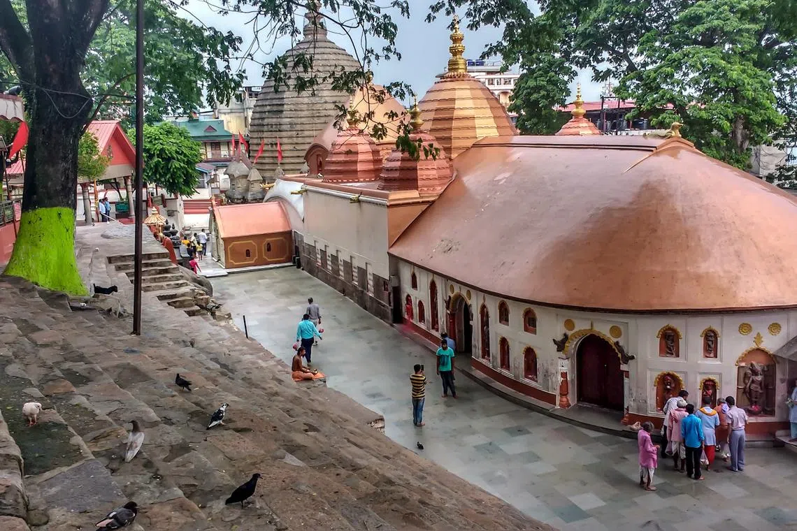 Devotees visit the Kamakhya temple in Guwahati, India, where a 64-year-old woman was killed in an alleged human sacrifice in 2019.