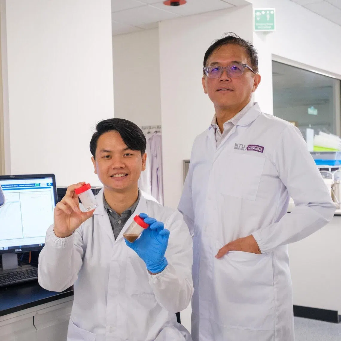 NTU-LKCMedicine researchers Damien Chua, a doctorate student (left), and Associate Professor Andrew Tan, the Provost's Chair in Metabolic Disorder at LKCMedicine, found a protein in stool that links diet, gut bacteria, and liver health. It could help prevent the early stages of fatty liver disease.