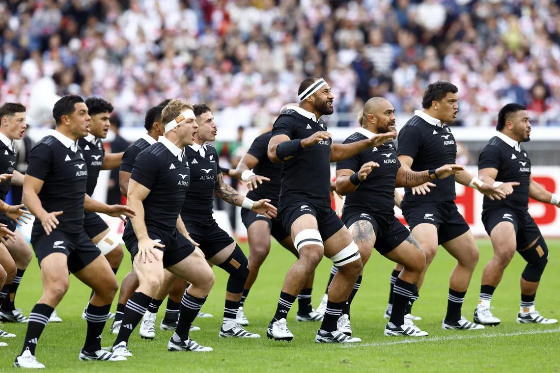 New Zealand players performing the haka before their 64-19 win over Japan in Yokohama on Oct 26. 