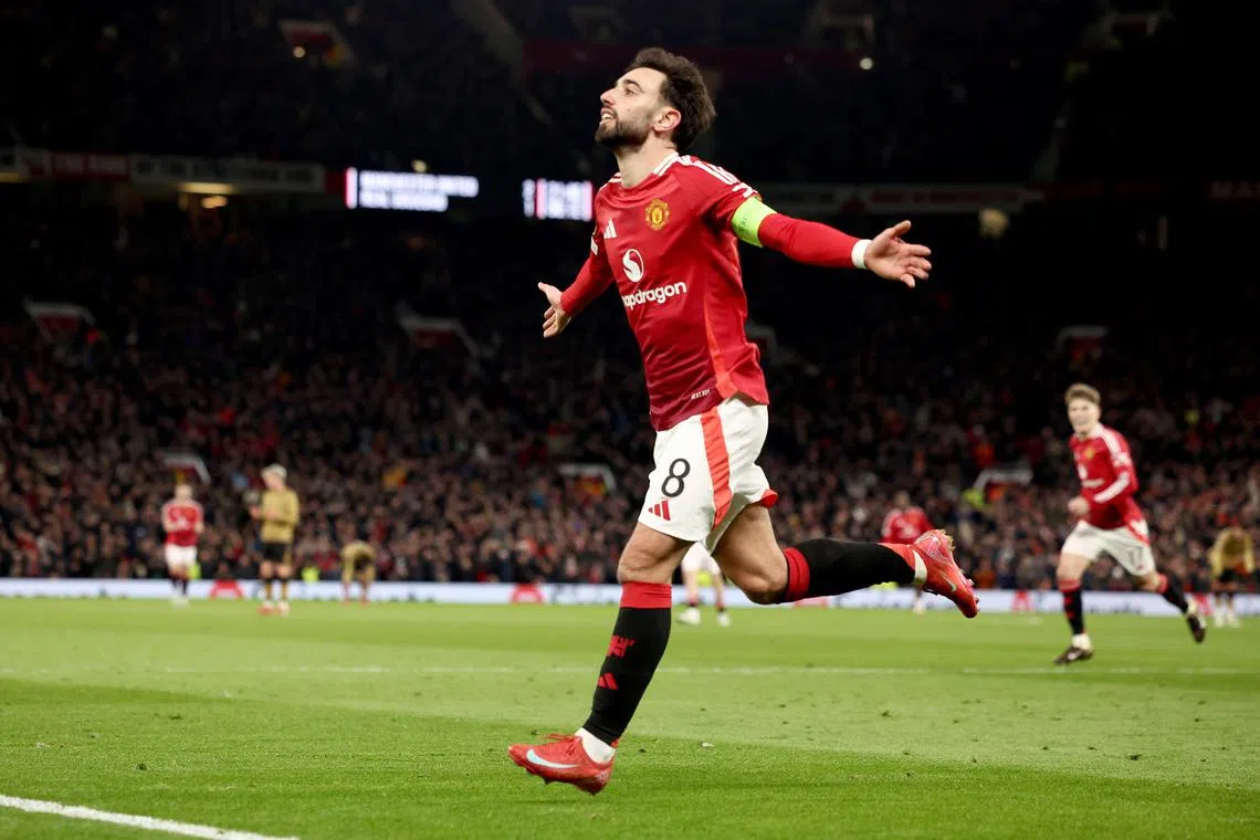 Manchester United's Bruno Fernandes celebrates scoring his third goal.