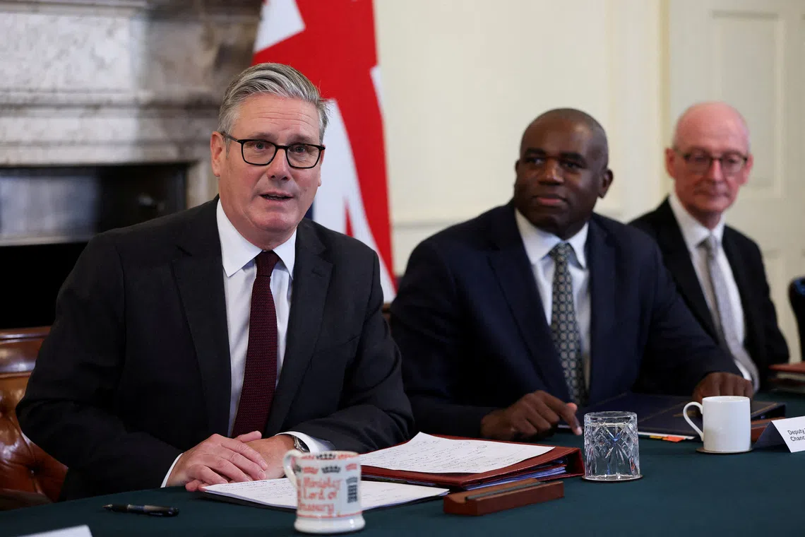 British Prime Minister Keir Starmer addresses a cabinet meeting, as Deputy Prime Minister David Lammy looks on, at 10 Downing Street, in London, Britain, September 9, 2025. REUTERS/Toby Melville/Pool