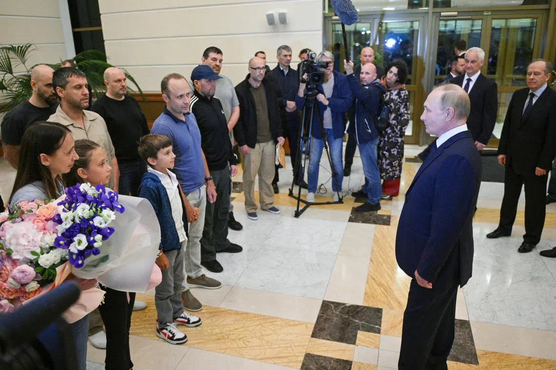 Mr Vladimir Putin welcomes Russian nationals, who were released in a prisoner exchange, at Vnukovo International Airport in Moscow, Russia, on Aug 1, 2024.