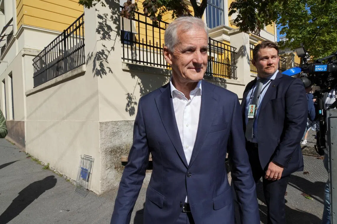 Norwegian Prime Minister Jonas Gahr Stoere walks away from a polling station after voting in Oslo, Norway, September 8, 2025. REUTERS/Tom Little