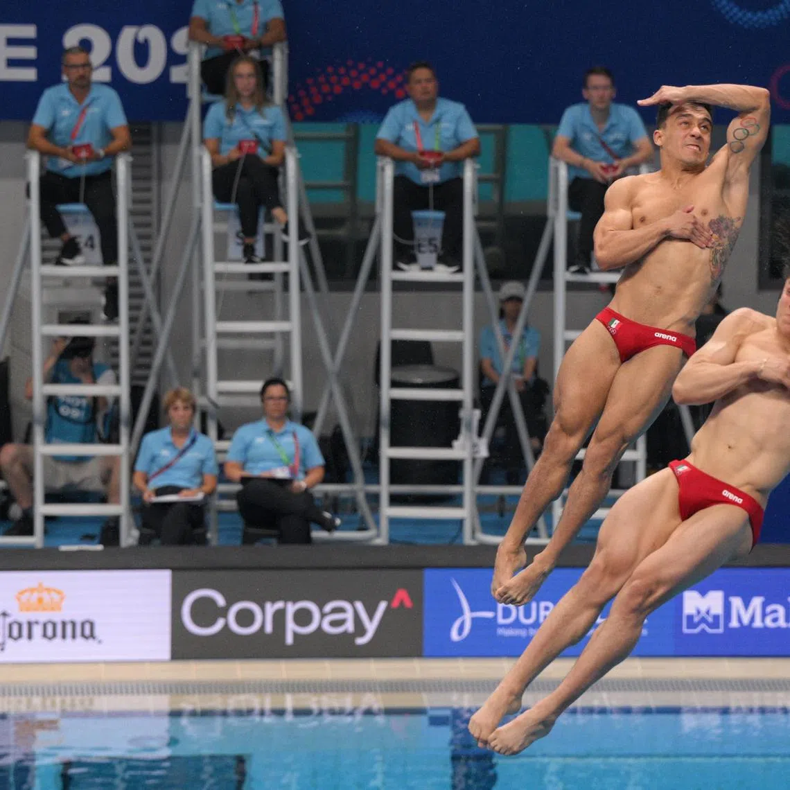 Juan Manuel Celaya Hernandez (left) and Osmar Olvera Ibarra of Mexico in action during the World Aquatics Championship Men's 3m Synchronised Diving final held at the OCBC Aquatic Centre on July 28, 2025.