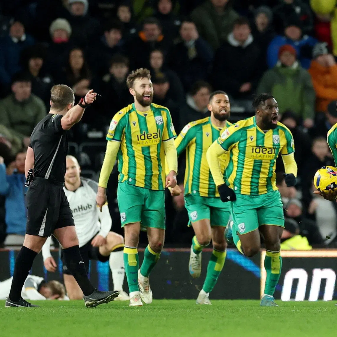 FILE PHOTO: Soccer Football - Championship - Derby County v West Bromwich Albion - Pride Park, Derby, Britain - January 23, 2026 West Bromwich Albion players celebrate after Chris Mepham scores their first goal Action Images/Andrew Boyers/File Photo