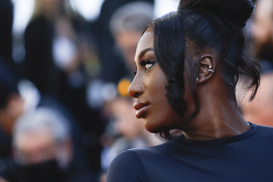 FILE PHOTO: The 75th Cannes Film Festival - Screening of the film \"Armageddon Time\" in competition - Red Carpet Arrivals - Cannes, France, May 19, 2022.  Aya Nakamura poses. REUTERS/Stephane Mahe/File Photo
