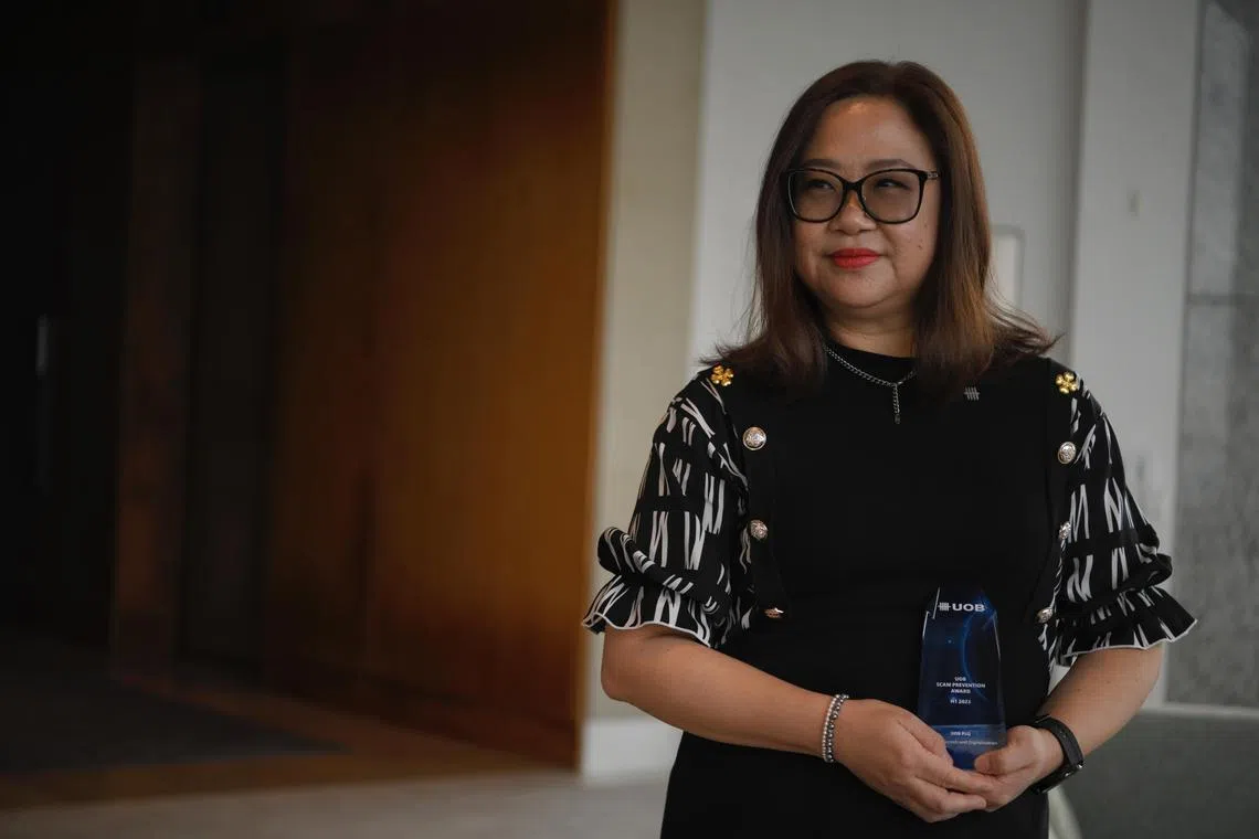 Ms Teo Shaw Leng saved a customer from losing $500,000 in insurance savings to a love scam.