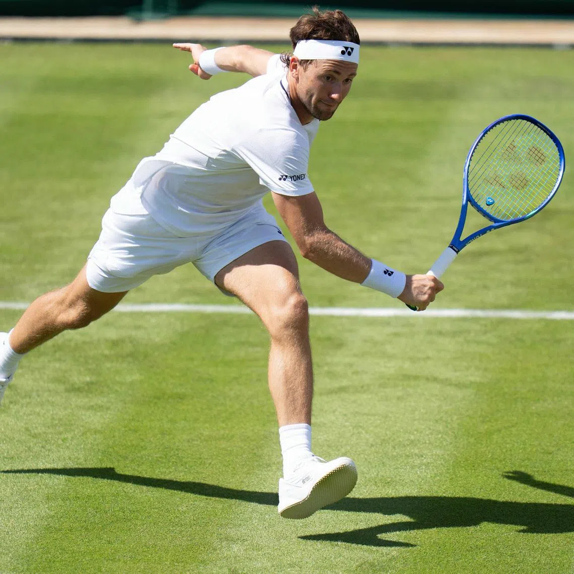 FILE PHOTO: Jun 29, 2026; London, United Kingdom;  Casper Ruud of Norway returns a shot during his match against Hubert Hurkacz of Poland  on day one at All England Lawn Tennis and Croquet Club. Mandatory Credit: Susan Mullane-Imagn Images/File Photo