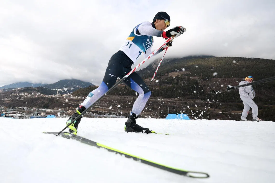 Milano Cortina 2026 Olympics - Nordic Combined - Individual Gundersen Normal Hill/10km, Cross-Country - Tesero Cross-Country Skiing Stadium, Lago, Italy - February 11, 2026. Akito Watabe of Japan in action during the cross-country race. REUTERS/Kacper Pempel