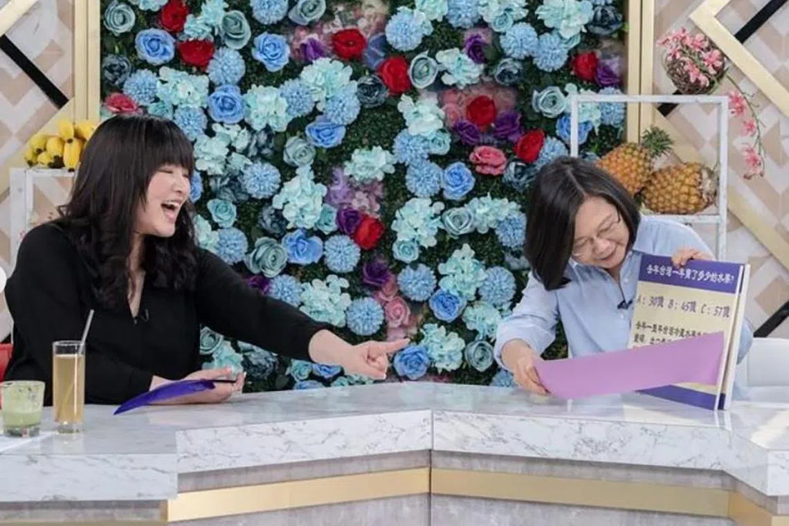 Jesse Tang (left) is also known for hosting a chat show featuring prominent guest stars including Taiwanese President Tsai Ing-wen.
