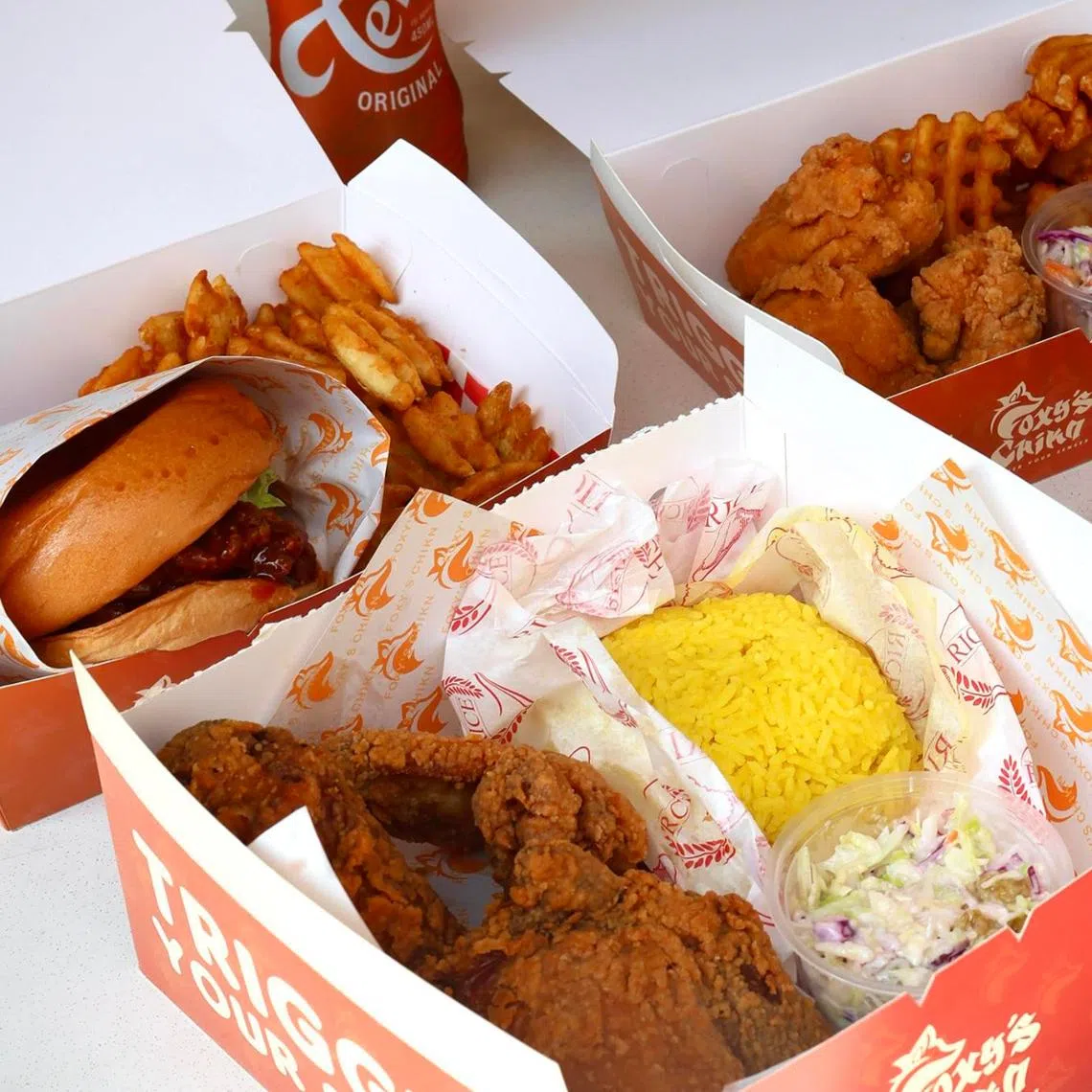 Clockwise from top left: 3 Piece Chikn Set, Tenders Set, Chikn Sandwich Set and Battered Fries at Foxy’s Chikn.