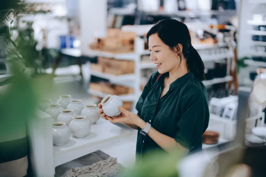 5.5 sale in Singapore: Woman shopping in a store for pots