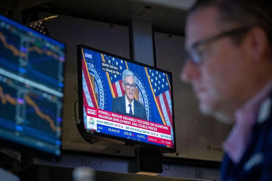 A TV station broadcasting US Federal Reserve chairman Jerome Powell, on the floor of the New York Stock Exchange, on Jan 29.