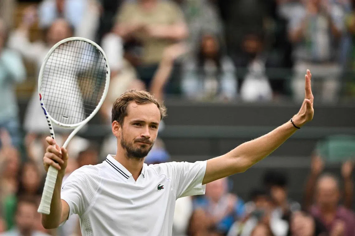 Russia's Daniil Medvedev celebrates winning against US player Christopher Eubanks.